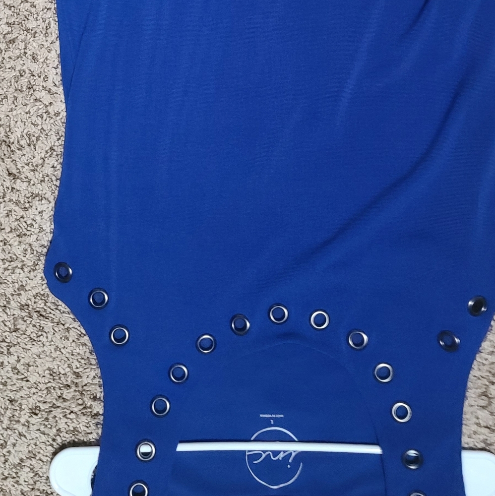 This woman's top never been worn by ink